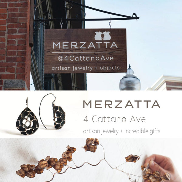 Merzatta store sign hanging above the entrance