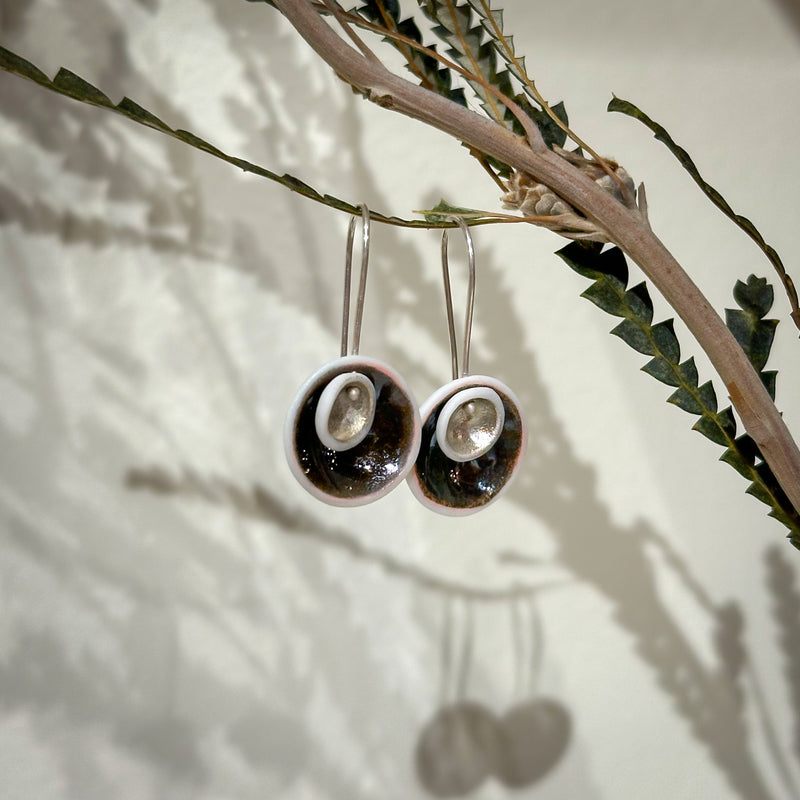 Medium Nest Pod Earrings, black and silver - light