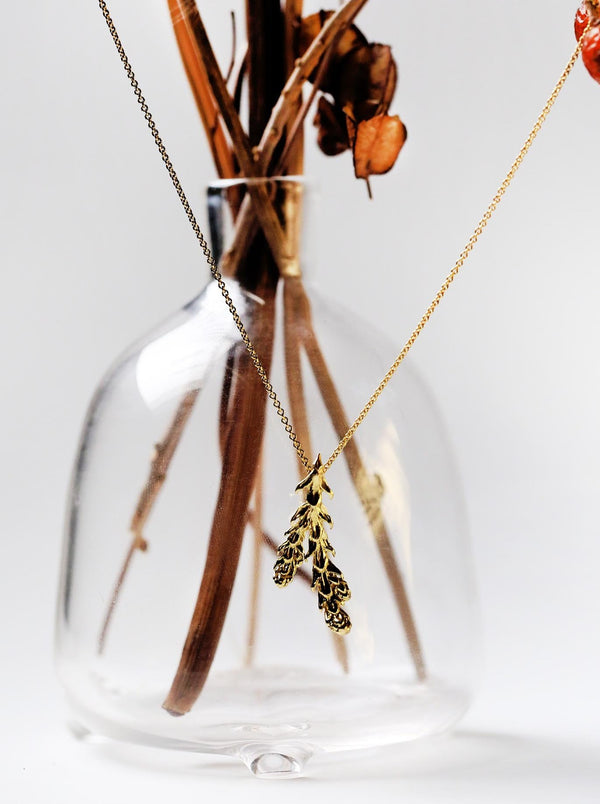 Gold Deerhorn Cedar Pendant